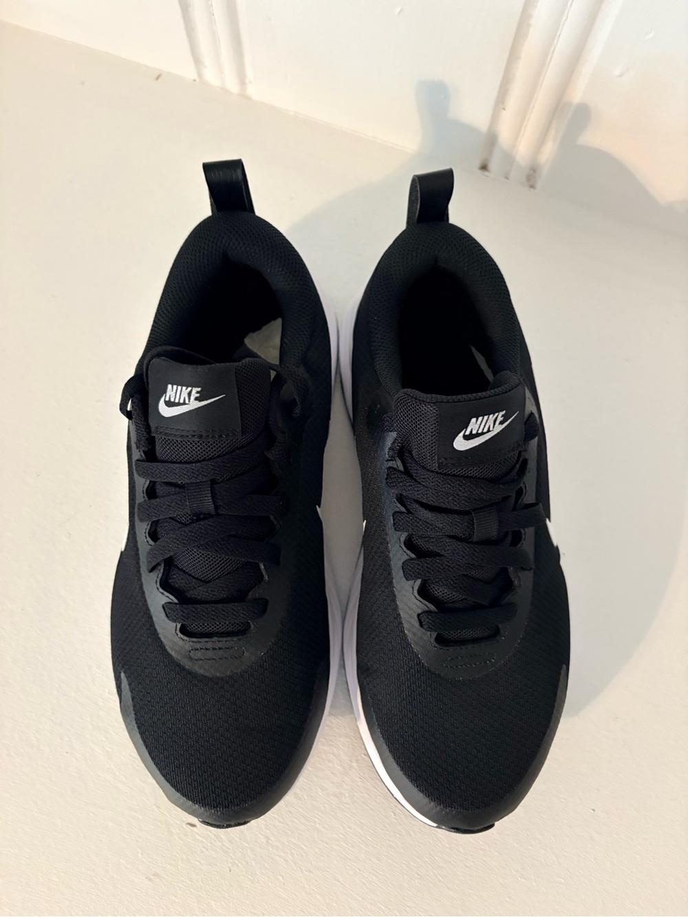 Nike Women’s 7 Wide Black and White Athletic Running Sneakers